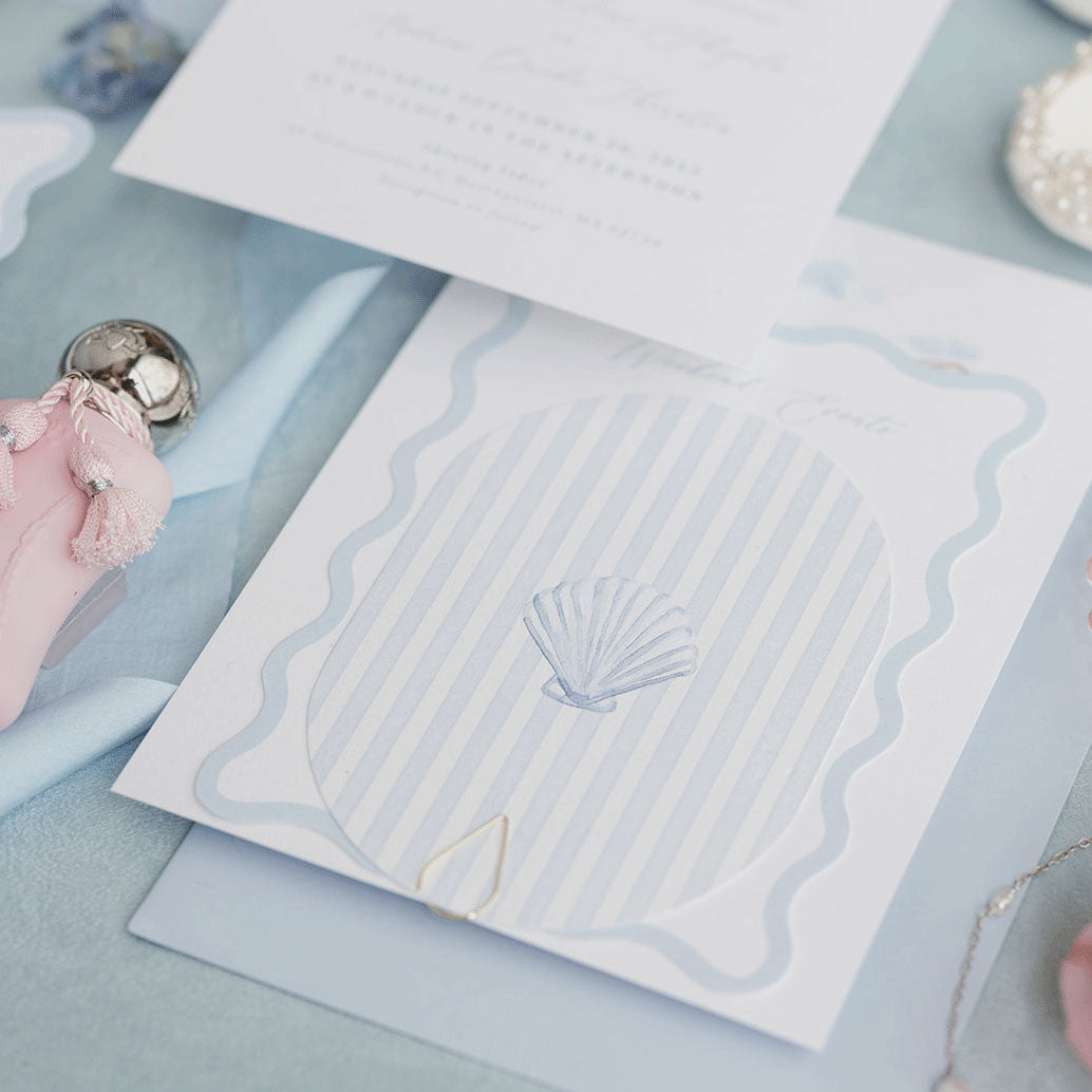 Custom shaped wedding invitation RSVP card and details card in blue wiht pinstripe and shell detail